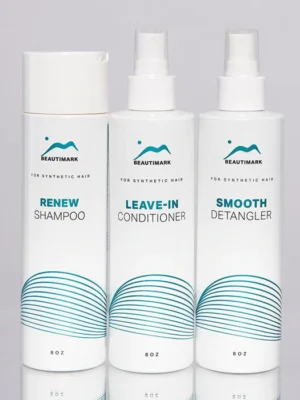 A trio of hair care products including renew shampoo, leave-in conditioner, and smooth detangler designed for synthetic hair, aligned against a neutral backdrop in the 3 Piece Synthetic Must Haves Kit.